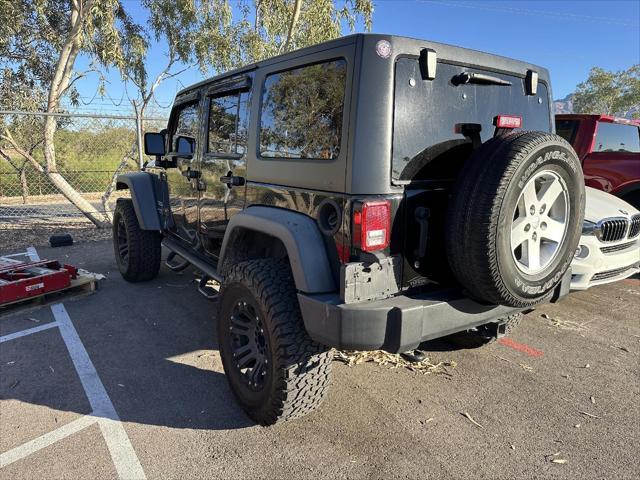 used 2013 Jeep Wrangler Unlimited car, priced at $13,990