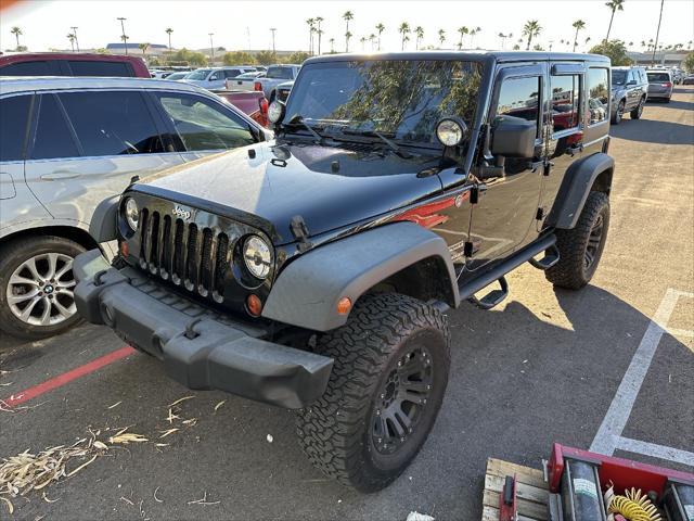 used 2013 Jeep Wrangler Unlimited car, priced at $13,990