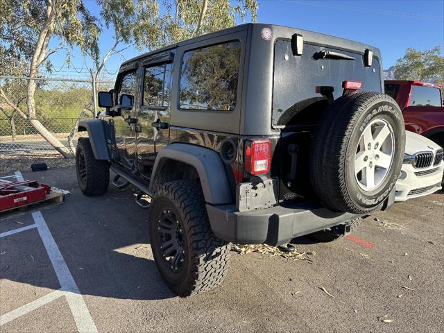 used 2013 Jeep Wrangler Unlimited car, priced at $13,990