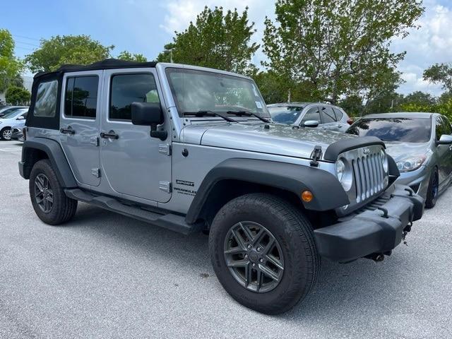 used 2017 Jeep Wrangler Unlimited car, priced at $23,236