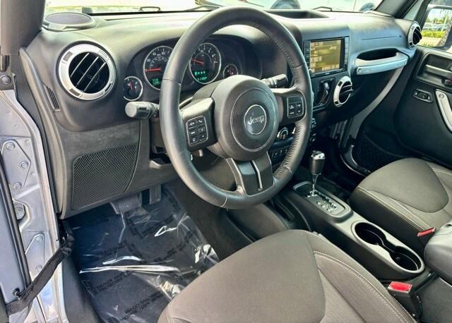 used 2015 Jeep Wrangler Unlimited car, priced at $19,901
