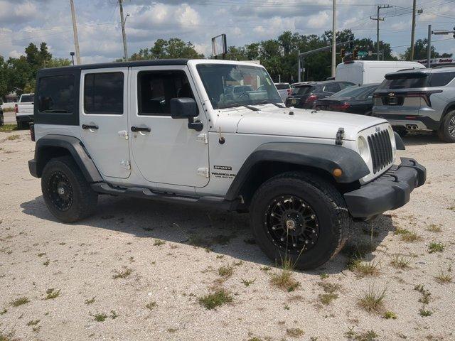used 2014 Jeep Wrangler Unlimited car, priced at $13,984