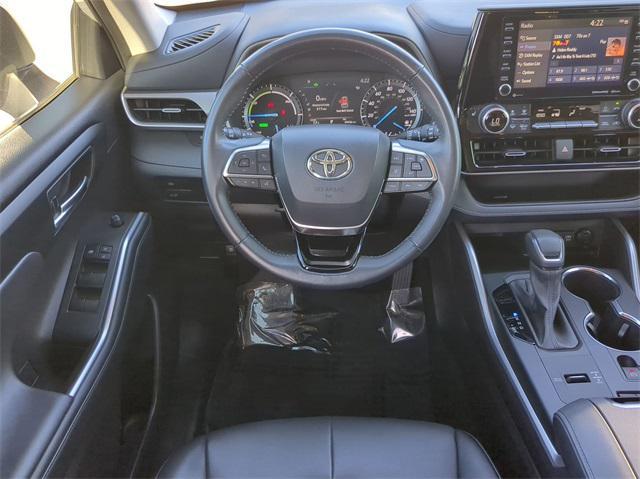 used 2021 Toyota Highlander Hybrid car, priced at $33,999