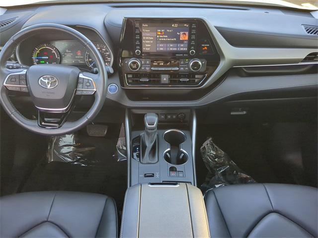 used 2021 Toyota Highlander Hybrid car, priced at $33,999