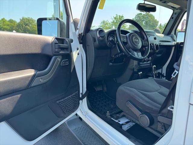 used 2015 Jeep Wrangler Unlimited car, priced at $18,362