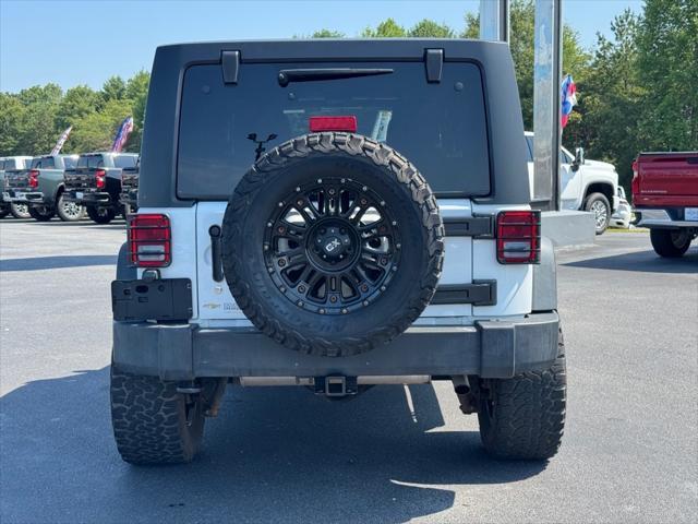 used 2015 Jeep Wrangler Unlimited car, priced at $18,362