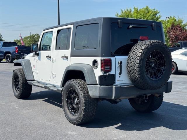 used 2015 Jeep Wrangler Unlimited car, priced at $18,362