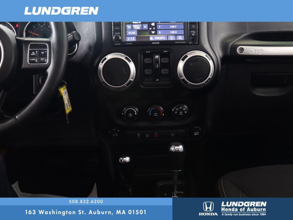 used 2015 Jeep Wrangler Unlimited car, priced at $19,997