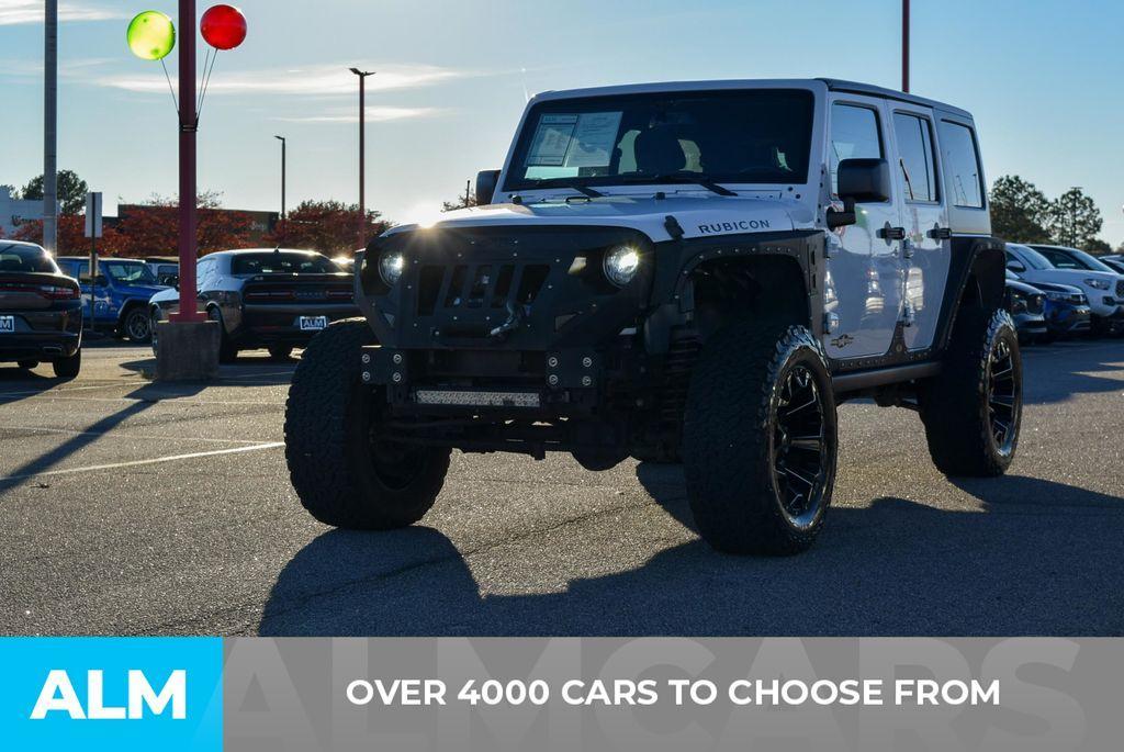 used 2017 Jeep Wrangler Unlimited car, priced at $29,920