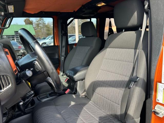 used 2011 Jeep Wrangler Unlimited car, priced at $15,899