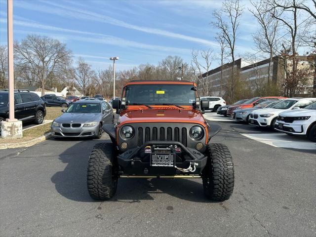 used 2011 Jeep Wrangler Unlimited car, priced at $15,899