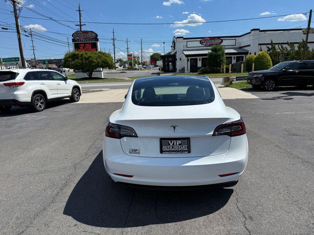 used 2022 Tesla Model 3 car, priced at $20,995