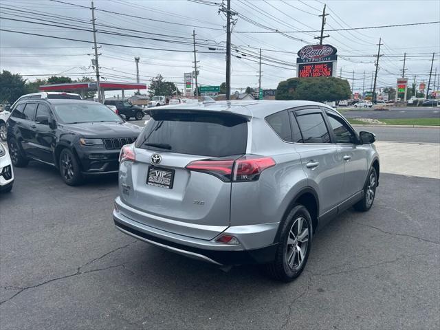 used 2018 Toyota RAV4 car, priced at $19,899