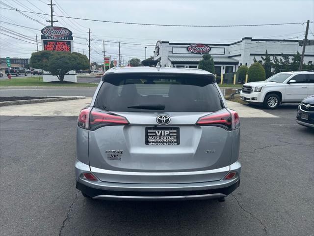 used 2018 Toyota RAV4 car, priced at $19,899