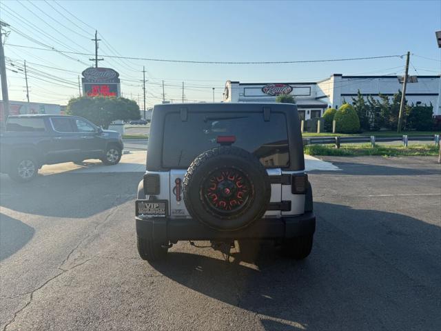 used 2016 Jeep Wrangler Unlimited car, priced at $17,395