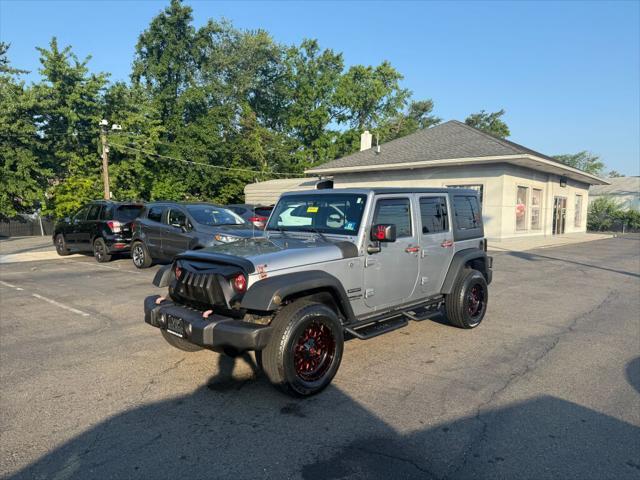 used 2016 Jeep Wrangler Unlimited car, priced at $17,395
