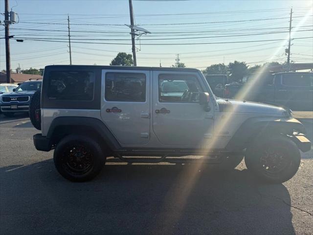 used 2016 Jeep Wrangler Unlimited car, priced at $17,395