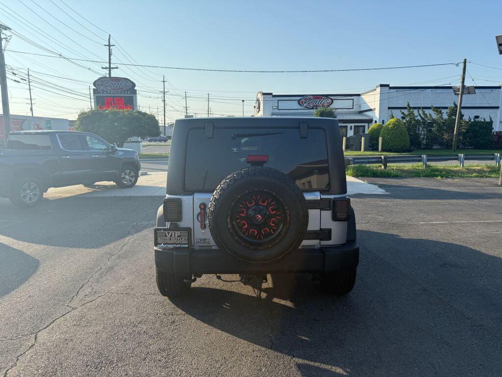 used 2016 Jeep Wrangler Unlimited car, priced at $16,295