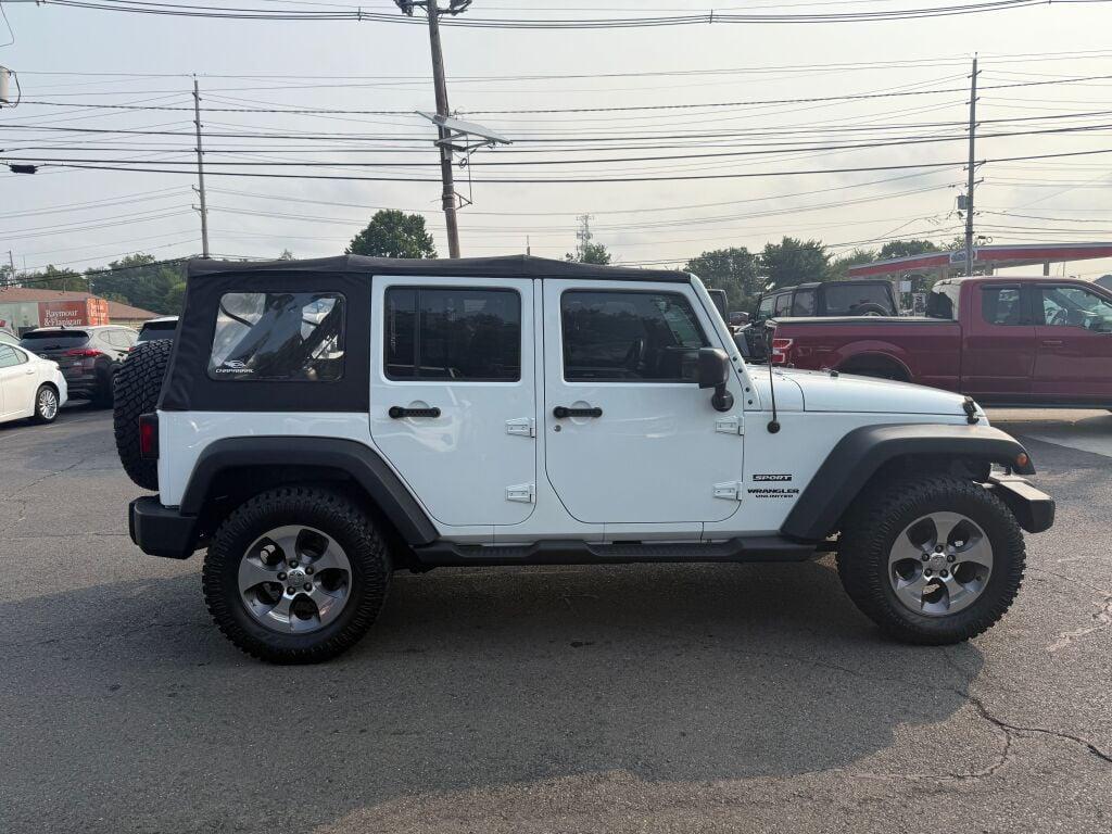used 2015 Jeep Wrangler Unlimited car, priced at $15,495