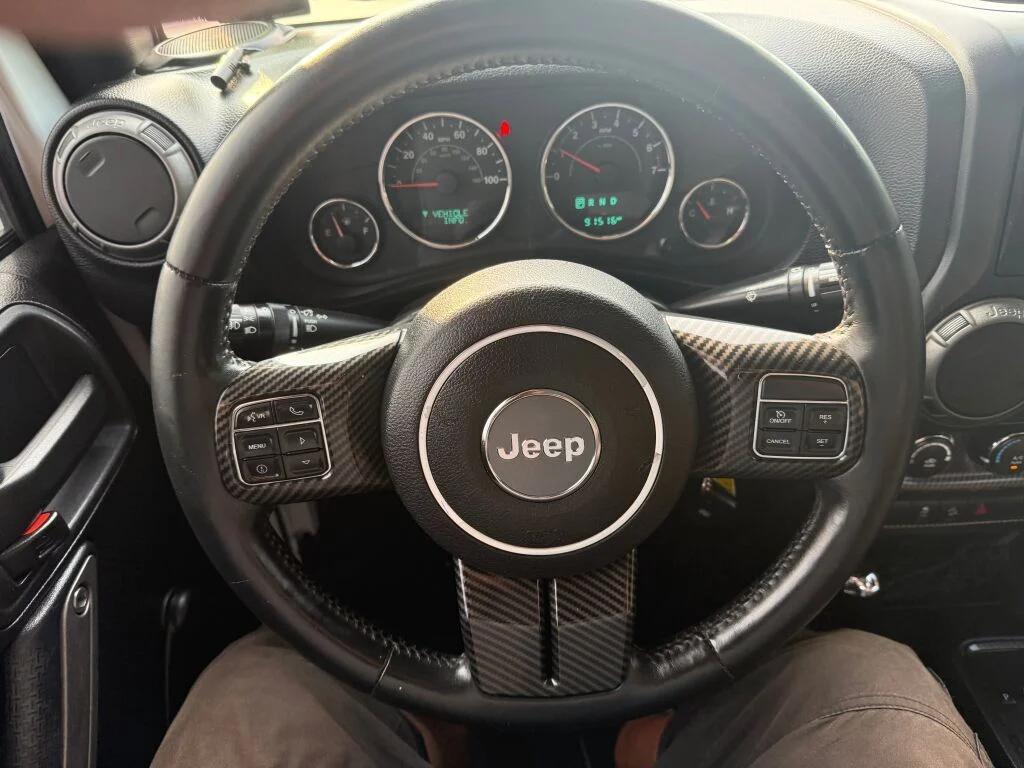 used 2015 Jeep Wrangler Unlimited car, priced at $15,495