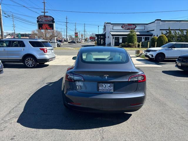 used 2022 Tesla Model 3 car, priced at $20,525