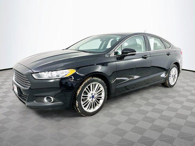 used 2016 Ford Fusion car, priced at $15,477