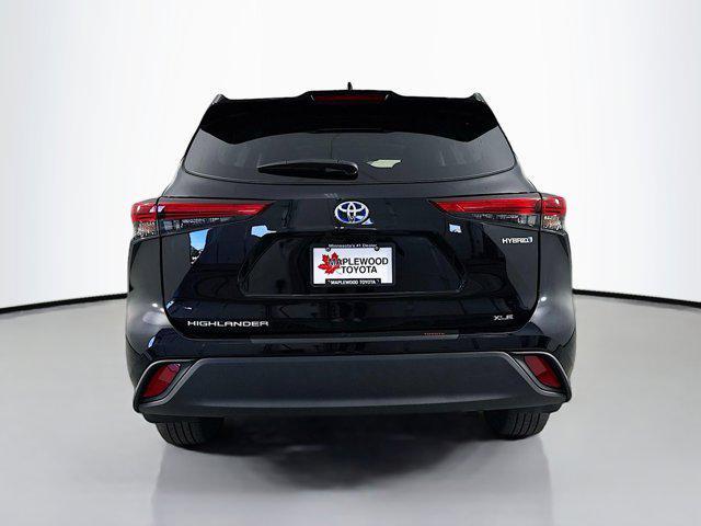 used 2022 Toyota Highlander Hybrid car, priced at $45,192