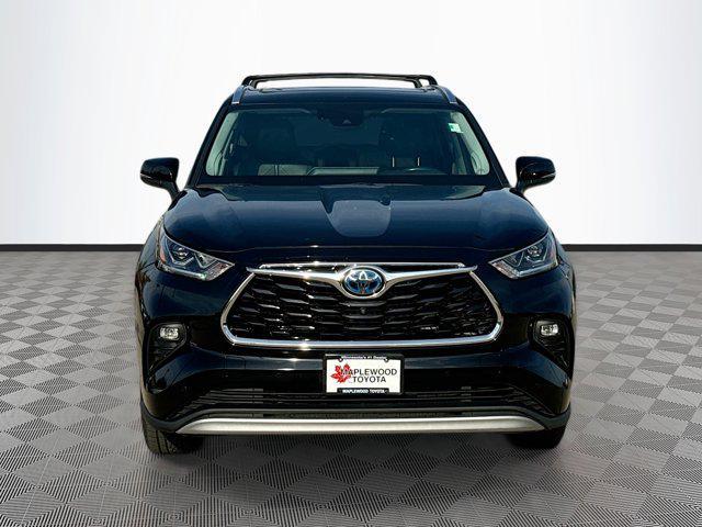 used 2021 Toyota Highlander Hybrid car, priced at $36,977