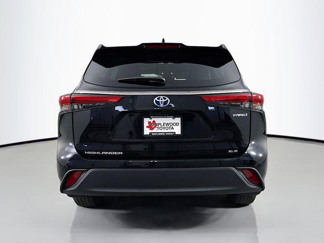 used 2021 Toyota Highlander Hybrid car, priced at $38,977