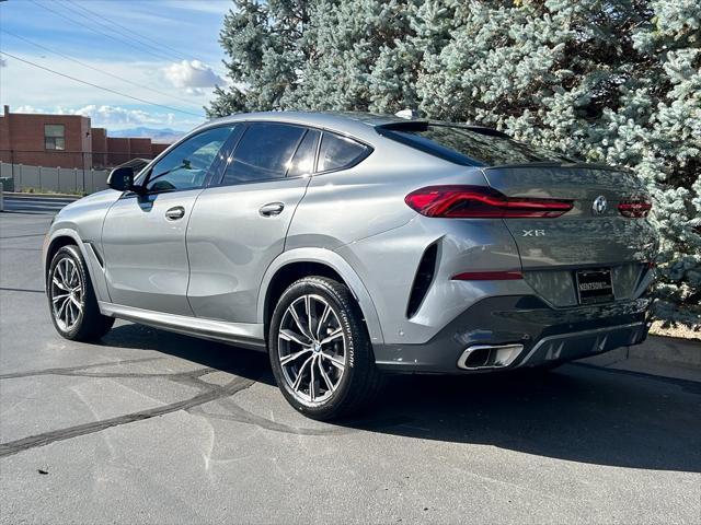 used 2024 BMW X6 car, priced at $62,950