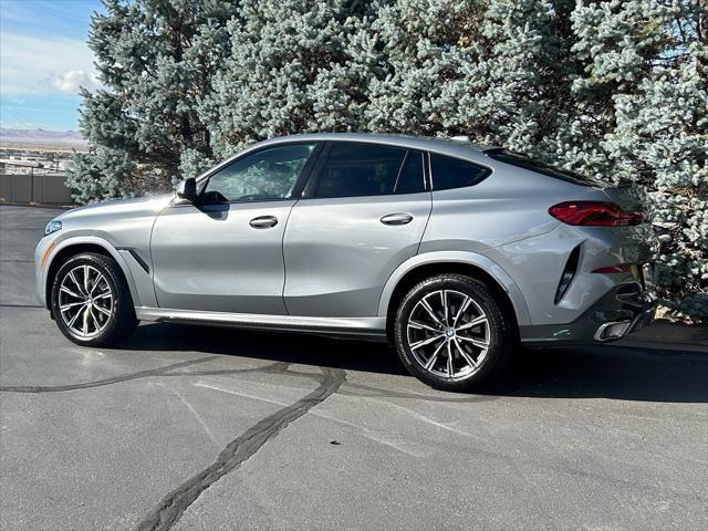 used 2024 BMW X6 car, priced at $62,950