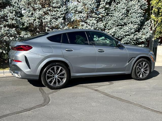 used 2024 BMW X6 car, priced at $62,950