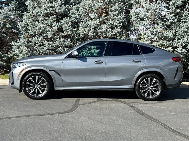 used 2024 BMW X6 car, priced at $62,950