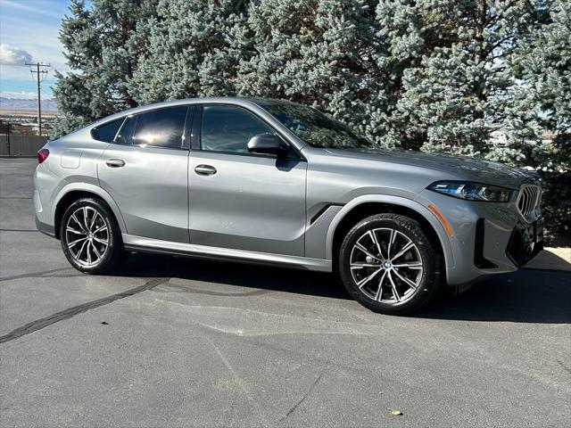 used 2024 BMW X6 car, priced at $62,950