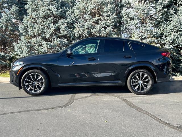 used 2024 BMW X6 car, priced at $63,550