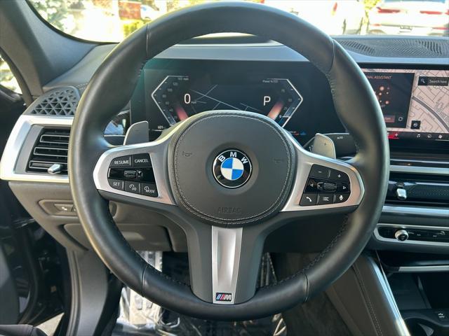 used 2024 BMW X6 car, priced at $63,550