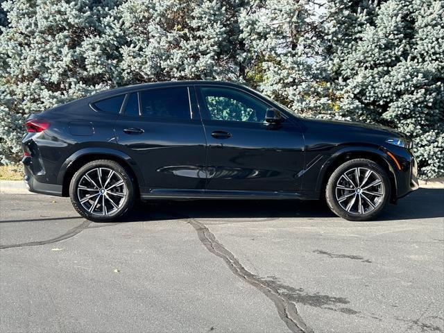 used 2024 BMW X6 car, priced at $63,550