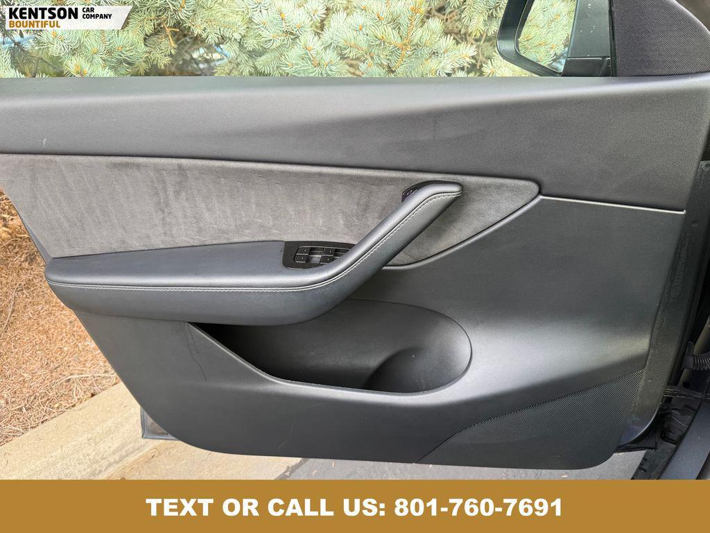 used 2021 Tesla Model Y car, priced at $27,950