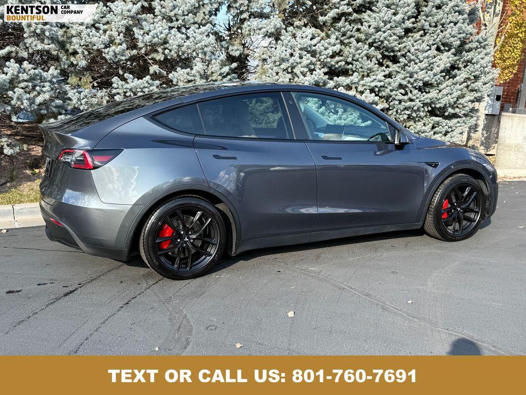 used 2022 Tesla Model Y car, priced at $27,550