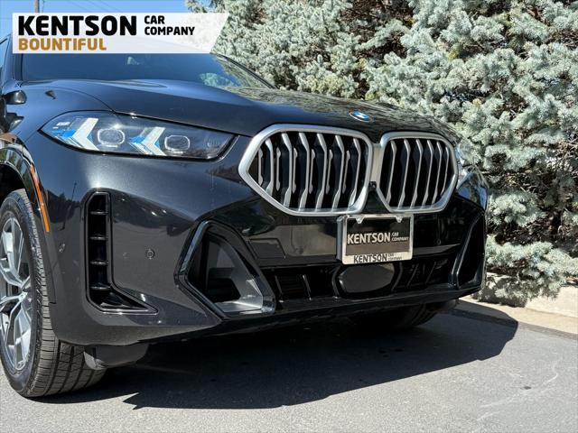 used 2025 BMW X6 car, priced at $66,950
