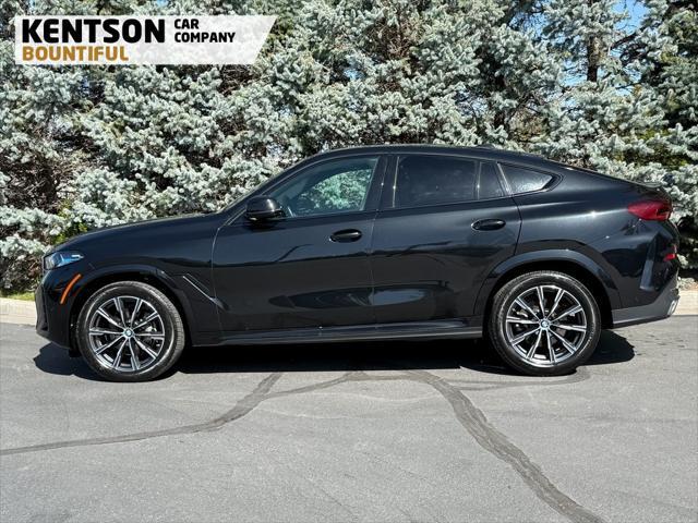 used 2025 BMW X6 car, priced at $66,950