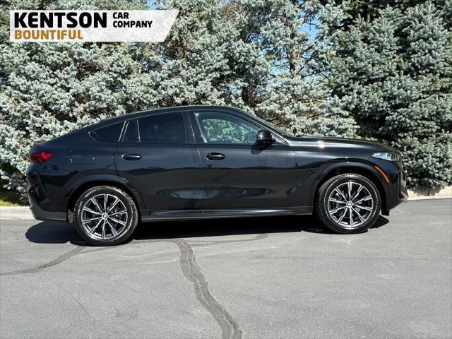 used 2025 BMW X6 car, priced at $66,950
