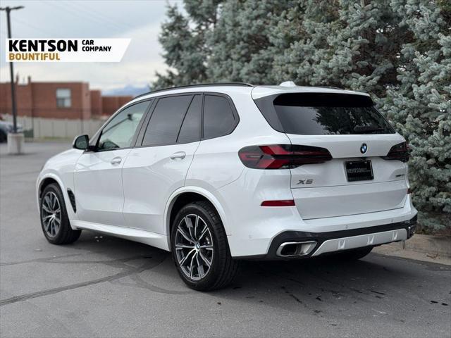 used 2025 BMW X5 car, priced at $58,950
