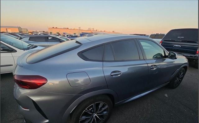 used 2024 BMW X6 car, priced at $63,950