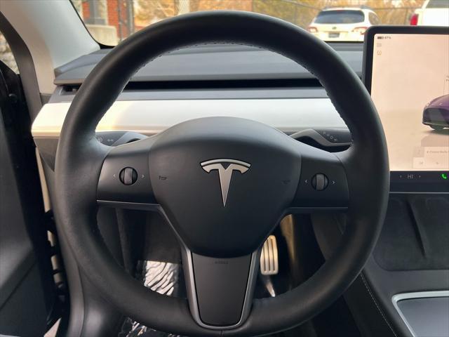 used 2023 Tesla Model Y car, priced at $34,950