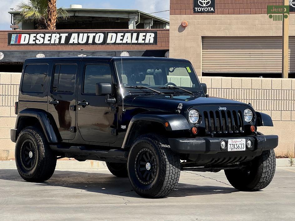 used 2011 Jeep Wrangler Unlimited car, priced at $15,500