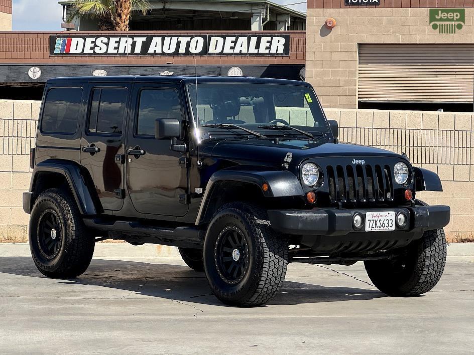 used 2011 Jeep Wrangler Unlimited car, priced at $15,500