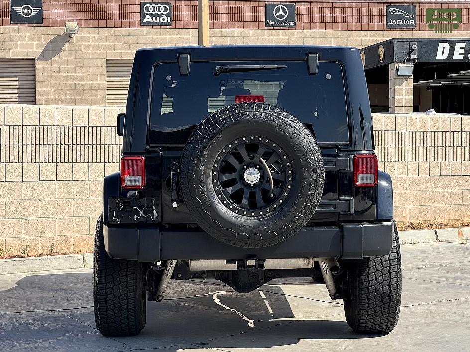 used 2011 Jeep Wrangler Unlimited car, priced at $15,500