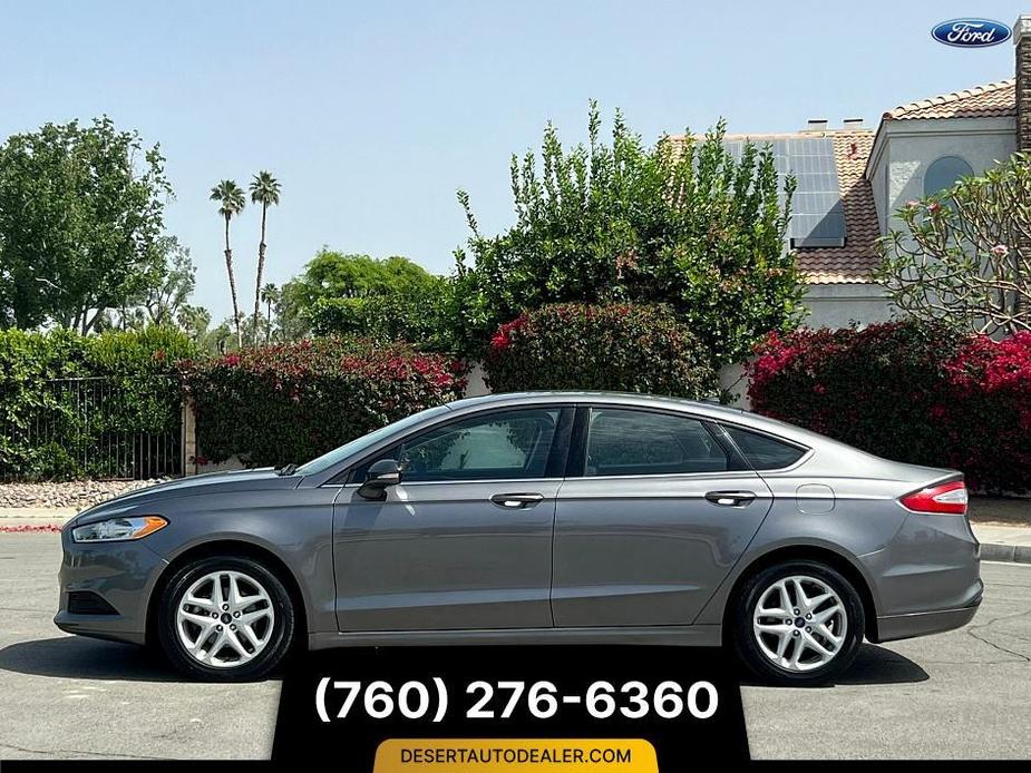 used 2014 Ford Fusion car, priced at $11,999