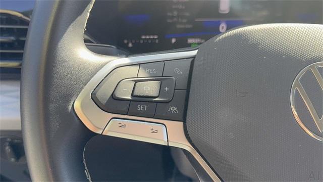 used 2023 Volkswagen Taos car, priced at $19,570